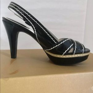 Studio Paolo Heel Size 6.5 New. Super cute high gloss look with white stitching.